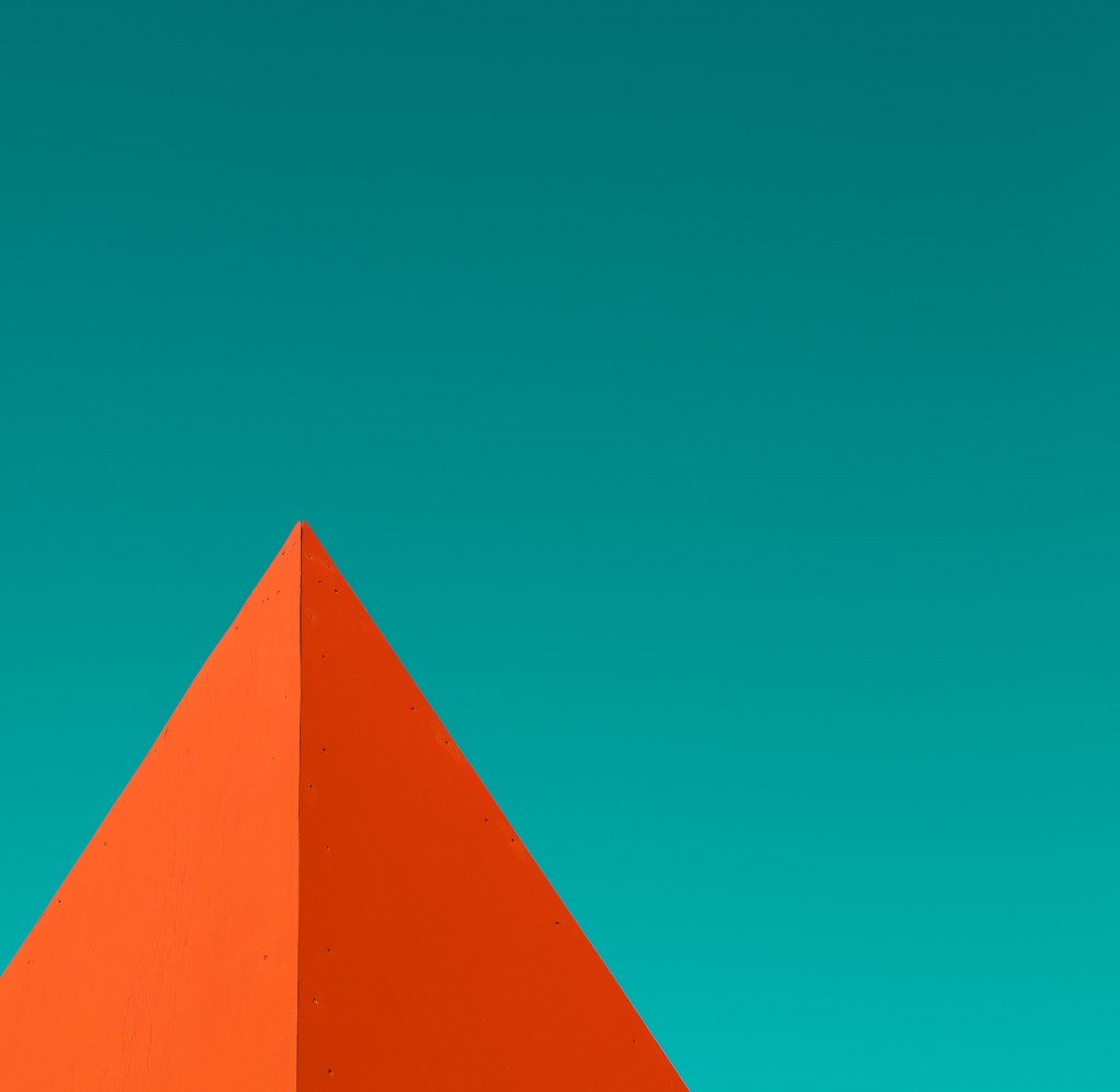 Android 5.0 Lollipop Wallpaper pirámide naranja fondo verde